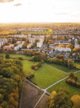Urban settlement next to forest and green spaces in autumn, Sindelfingen, Böblingen district,