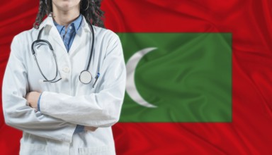 Medical professional on Maldivian flag. Healthcare and wellness in Maldives, Concept