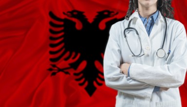 Medical professional on Albania flag. Healthcare and wellness in Albania, Concept