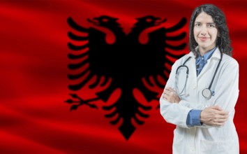 Albanian medicine and healthcare concept. Close up of doctor against Albania flag background