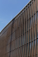 Modern wooden façade with larch pilasters, architecture firm caspar.schmitzmorkramer, Deiker Höfe,