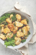 Fried cauliflower salad, with spices and herbs, homemade, no people