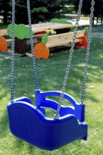 A bright blue swing hangs from sturdy chains in a lively playground. The well-maintained area