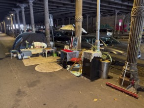 Homeless person's tent in Berlin's Gleim Tunnel. Decorated like an apartment, there is a table with