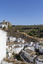 On the road to the white villages. Panorama or skyline of a historic old town with many white