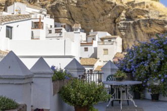 On the road to the white villages. Paths and narrow streets of a historic old town with many white