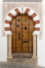 On the road to the white villages. Beautiful doors of the historic old town in Setenil de las