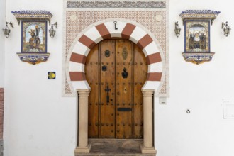 On the road to the white villages. Beautiful doors of the historic old town in Setenil de las