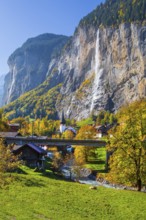 View of town and valley with Staubbach waterfall in autumn, Lauterbrunnen, Bernese Oberland, Canton