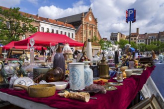 Old vintage things on the street flea market on Place du Jeu de Balle, Marolles district of