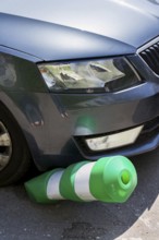 Car bending white and green safety traffic post with front bumper, wrong parking, car insurance,