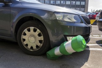 Car bending white and green safety traffic post with front bumper, wrong parking, car insurance,