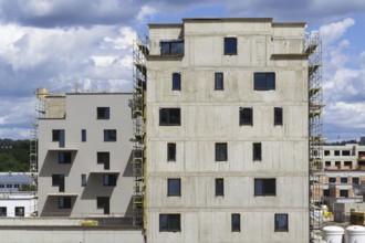 Horizontal photo of house apartment construction site with scaffolding Prague, Czech republic