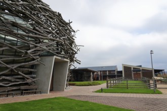 Capi hnizdo Storks Nest riding arena covered with wood resembling a giant birds nest on November