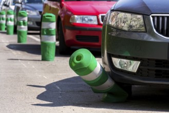 Car bending white and green safety traffic post with front bumper, wrong parking, car insurance,