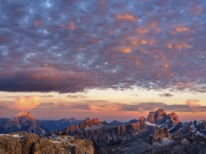 Alpenglühen, Rifugio Lagazuoi and rugged Dolomite peaks at sunset, Dolomites, Alps, Belluno