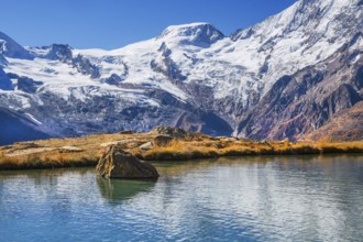 Kreuzbodensee with Alphubel 4206m in autumn, Saas-Grund, Saasertal, Valais, Switzerland
