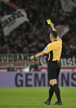 Referee Felix Zwayer shows yellow card yellow warning MHPArena, MHP Arena Stuttgart,