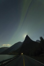 National mountain of Norway - Stetind in the Nordland under auroras and a full moon