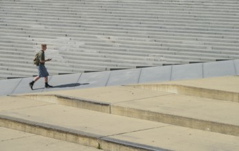 Walkers, stairs, Freedom Square, Tallinn, Estonia