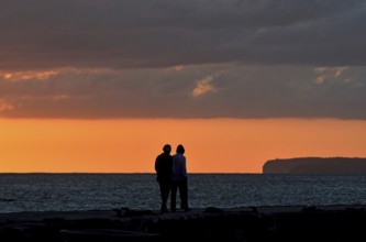 Silhoutte of an elderly couple at sunset time, Majorca, balearics, spain