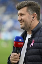 Managing Director Sports Andreas Schicker TSG 1899 Hoffenheim Portrait in interview microphone