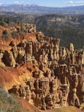 Impressive red rock landscape with sweeping views over layered, smoky rocks, Bryce Canyon National
