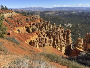Majestic red rock formations stretch across the valley with breathtaking views, Bryce Canyon