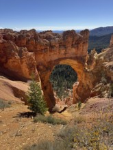 Close-up of an impressive natural rock arch in the Red Canyon, Bryce Canyon National Park is