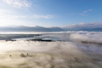Cloudy landscape with Forggensee and mountain panorama at dawn, near Roßhaupten, Ostallgäu, Allgäu,