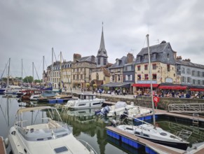 Honfleur, Normandy, France, May 30, 2025: Honfleur Vieux Bassin harbor with boats and yachts moored
