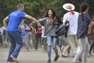 WROCLAW, POLAND - JULY 24, 2016: Dancing pilgrims of the World Youth Day during open concert Mercy