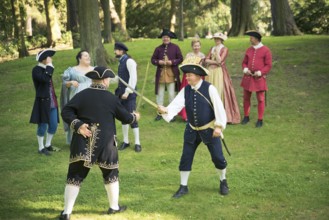 GDANSK, POLAND - August 15, 2017: Two men are fighting by the swords, during historical staging in