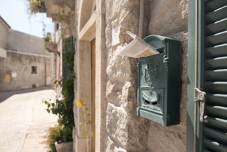 Mailbox. Purple home mailbox. Pink mailbox on Rovinj street, Croatia. Mediterranean style pink