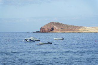 Dramatic cliffs around Montana Bocinegro and Montana Roja mountain, Tenerife coast near El Medano,