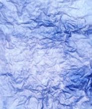A Burnt and wrinkled Paper Background. Backdrop