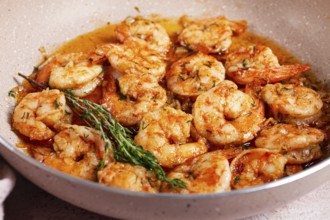 Shrimp dish cooked, in savory sauce. with fragrant herbs, and spices