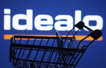 Dhaka, Bangladesh- 03 July 2025: Silhouette of a shopping cart in front of the idealo logo,