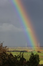 Rainbow over the Calenberger Land between Hanover and Hildesheim, wind turbines seen from the