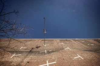 From a frog's eye view, the steep brick parking lot in Cologne's residential park looks almost like