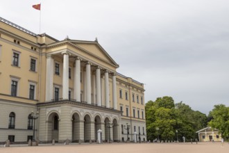 Royal Palace in Oslo with the Royal Standard of Norway hoisted at the top. The neoclassical