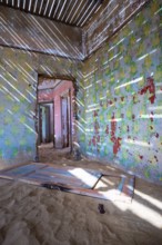 Building taken over by desert sand, in a former diamond town, today a ghost town, Lost Place,