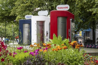 Public toilets on Karl Johans gate in central Oslo, painted in the three colours of the French flag
