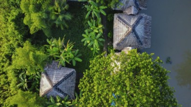 Nature resort next to a river in Vietnam, Asia, seen from above