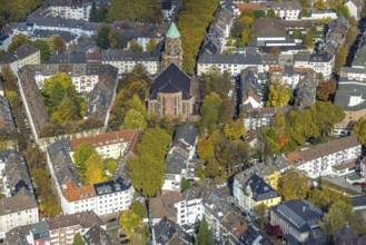 Aerial view, residential area with Catholic Church of St. Mary's Conception, autumn trees and tree