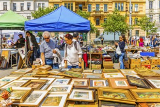 Antique and flea market, on the Chain Bridge south of the Naschmarkt, behind the historic facades