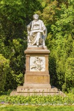 Monument with marble sculpture to Franz Schubert, Austrian composer, Stadtgarten, Vienna, Austria