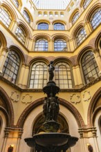 Donaunixen fountain in Palais Ferstel, Vienna, Austria