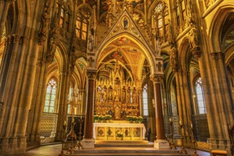 The main altar in the neo-gothic votive church, Vienna, Austria