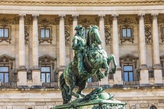 Monument to Prince Eugene, behind it the historic façade of the New Hofburg Imperial Palace,